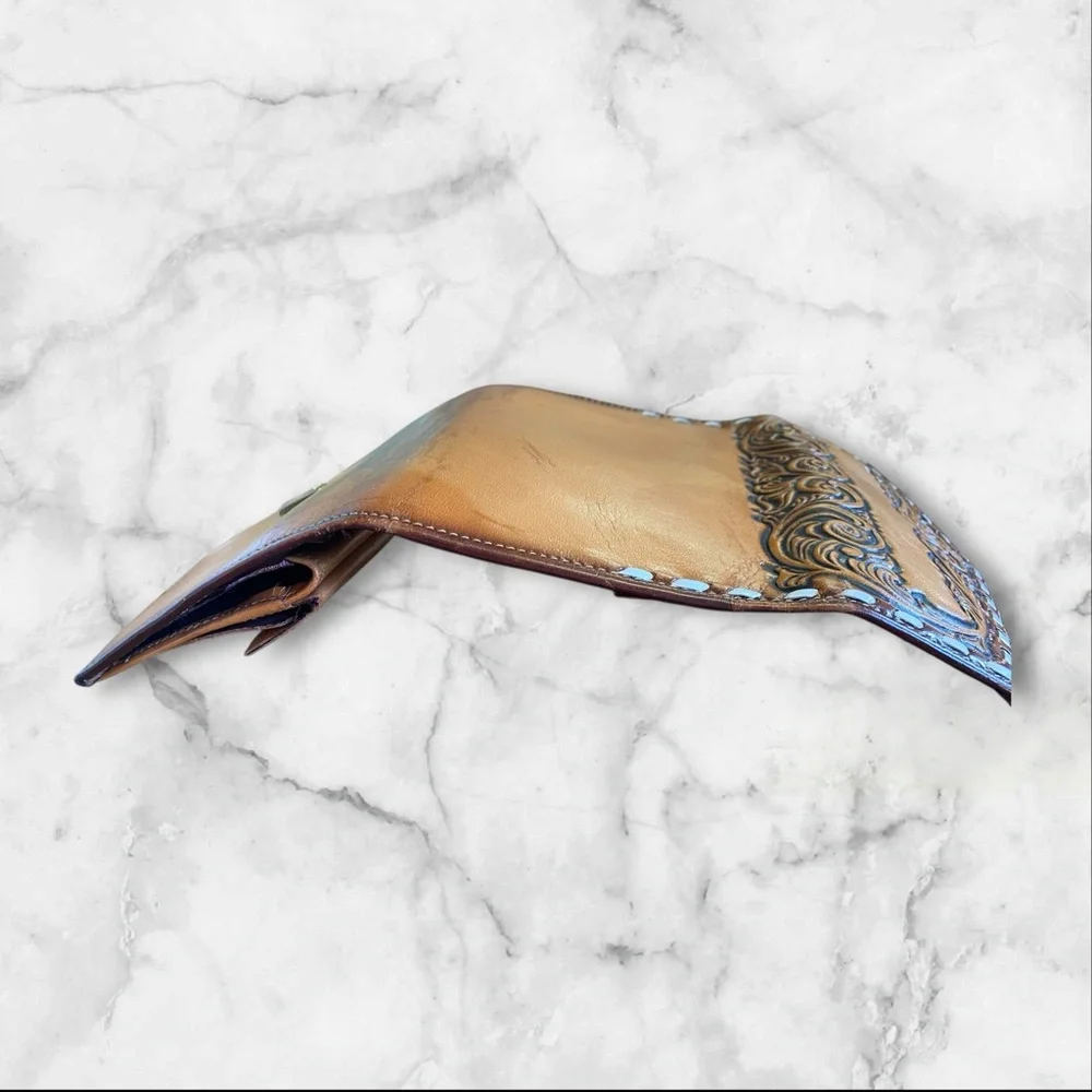 Leather billfold with check and pen spot